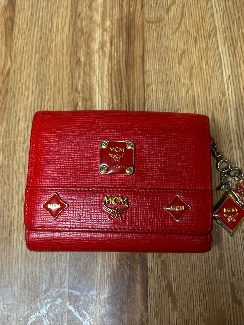 MCM Red Leather Trifold Wallet with Gold Emblems